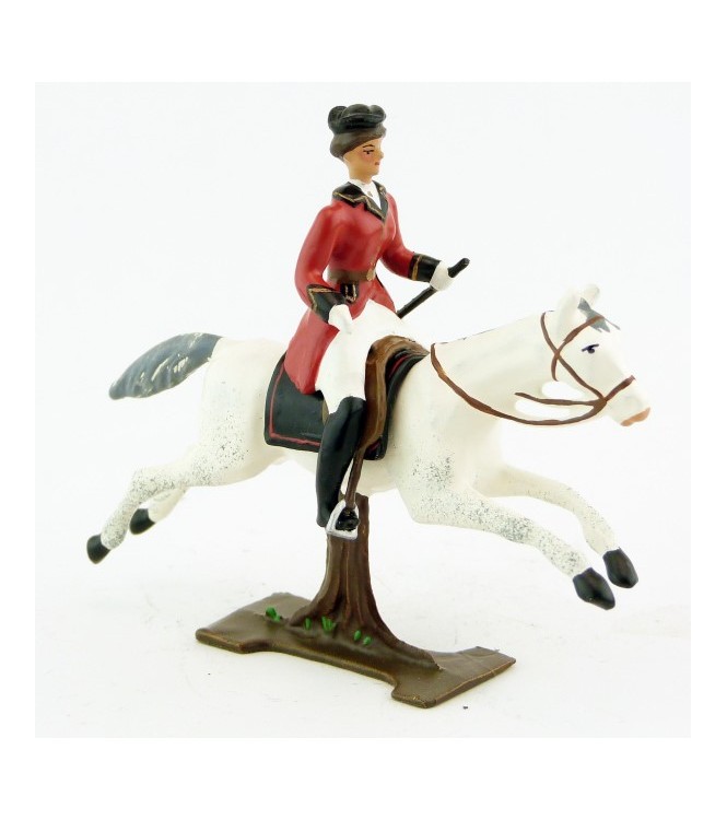 cavalière (cravache), redingote rouge, sur cheval blanc au galop (sur tronc)