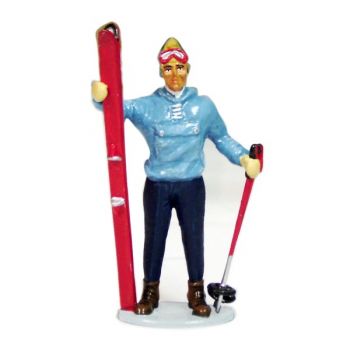 Skieur avec Skis à la main