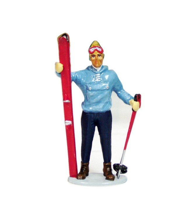 Skieur avec Skis à la main