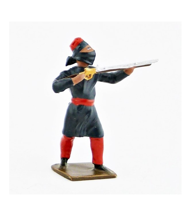 touareg au feu, tunique bleu foncé, pantalon rouge