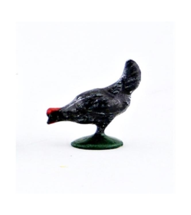 Poule noir picorant