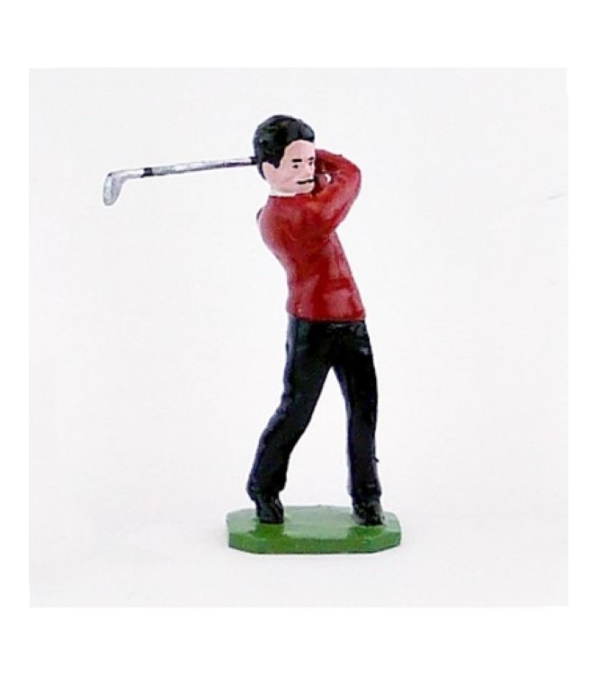 Golfeur brun, pull rouge, en fin de swing - Golfeurs (S.E.A)