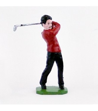Golfeur brun, pull rouge, en fin de swing - Golfeurs (S.E.A)