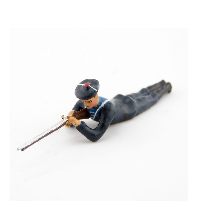 matelot des marins bleus couché, fusil en joue