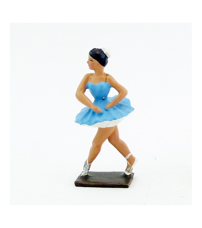ballerine (danseuse) mains autour de la taille, en tutu bleu