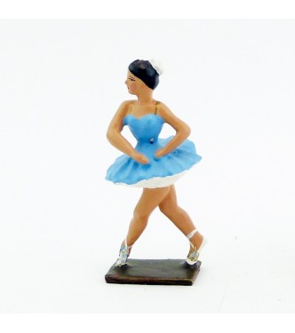 ballerine (danseuse) mains autour de la taille, en tutu bleu