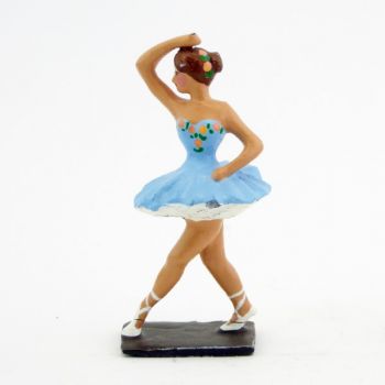 ballerine (danseuse) bras droit en l'air, en tutu bleu