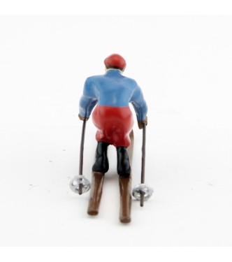 Skieur, années 20, blouson bleu et pantalon rouge