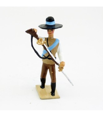 Mexicain pointant son fusil vers le sol