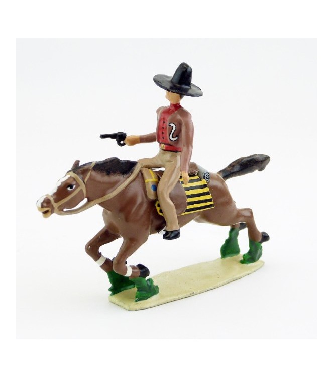 Cavalier mexicain avec revolver sur cheval au galop