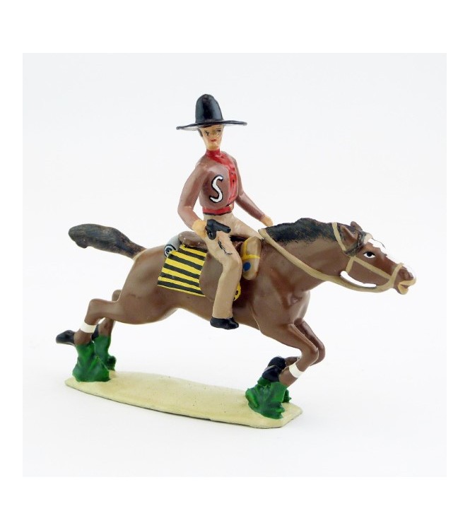 Cavalier mexicain avec revolver sur cheval au galop