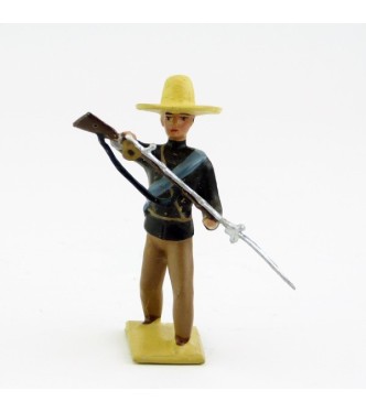 Mexicain pointant son fusil vers le sol