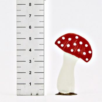 Petit champignon préhistorique rouge