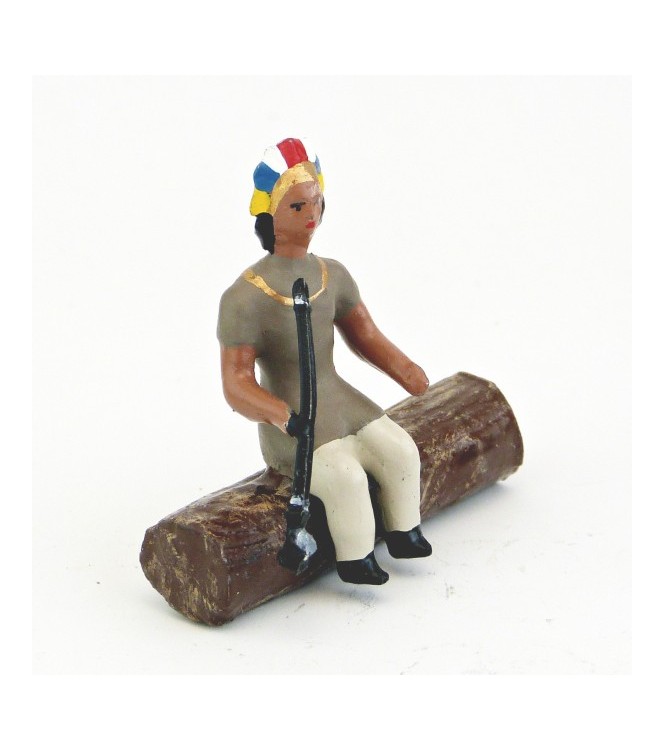 indien assis sur tronc d'arbre avec calumet