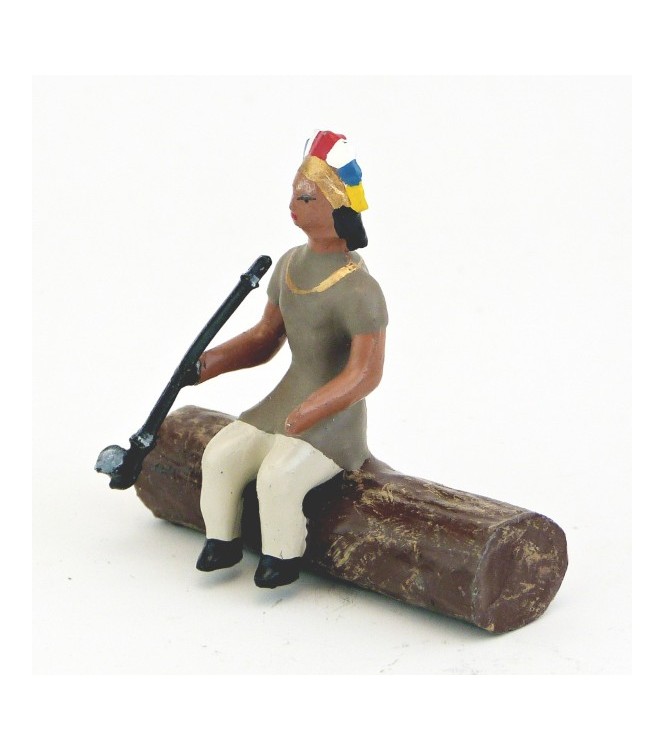 indien assis sur tronc d'arbre avec calumet