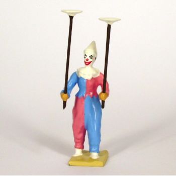 clown jonglant avec assiettes