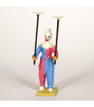 clown jonglant avec assiettes
