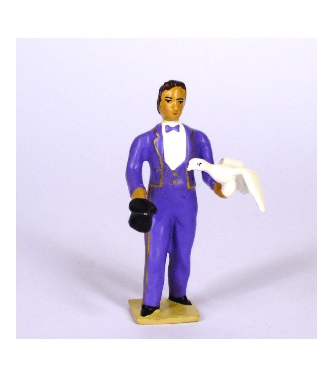 le magicien en costume violet, sortant une colombe de son chapeau