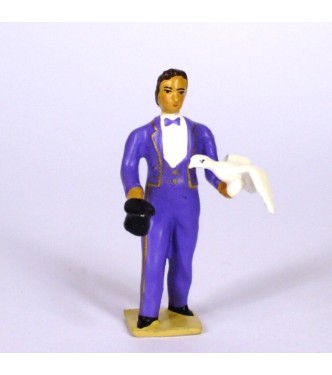 le magicien en costume violet, sortant une colombe de son chapeau