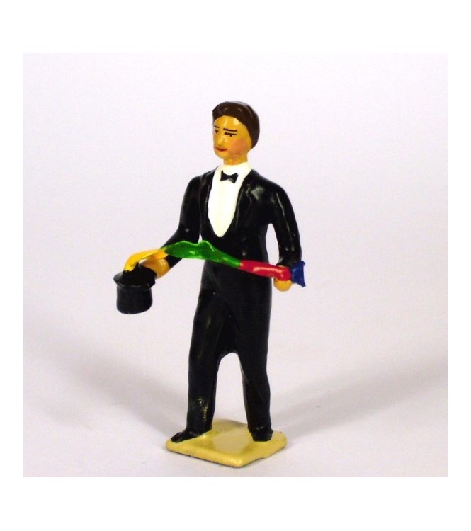 le magicien sortant une guirlande de foulards de son chapeau