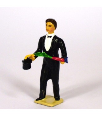 le magicien sortant une guirlande de foulards de son chapeau