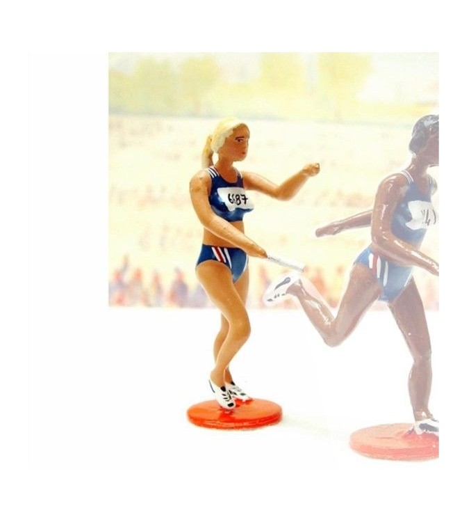 la coureuse de relais passant le relais